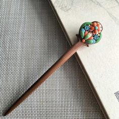 This is an order to make list, please allow 2 weeks before shipping. Crafted from pure natural ebony wood, the hairpin measures 17.6cm in length.  This elegant hairpin is made from natural peach wood, featuring hand-sculpted polymer clay fortune pattern on both sides. Its 3D design and unique Oriental charm make it a standout piece.  Available in two sizes: 17.6cm Unique gift you can choose for yourself, or your family and friends :-) Floral Letters Diy, Clay Peach, Chinese Hairpin, Letter Diy, Free Standing Lace, Hair Fork, Artificial Silk Flowers, Handmade Hair Accessories, Floral Letters