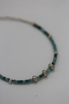 The bracelet is composed of small pieces of bright blue and brownish colour natural turquoise and handmade silver pieces; it closes with a round spring ring and there is a chain that allows for adjusted length. Turquoise is one of the oldest protection amulets, and was also known as a symbol of wealth and nobility in many ancient cultures. The bracelet can be combined with a matching turquoise and silver beads necklace. It is also really nice in combination with other tiny bracelets. All silver Turquoise Sterling Silver Beaded Bracelets, Symbol Of Wealth, Protection Amulet, Silver Bead Necklace, Silver Bead Bracelet, Blue And Brown, Amulets, Ancient Cultures, Silver Pieces