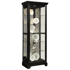 a display case with glass doors and plates on it's sides, all in black