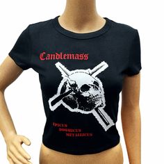 Candlemass Bella & Canvas brand black cropped ribbed baby tee. I use a high quality red and white stretch heat transfer vinyl.  Majority of items in my shop are all screen printed but this item isn't and is made with heat transfer vinyl! Please keep that in mind before purchasing. Materials: 52% cotton 48% polyester Mannequin is wearing a size Small in the photos  Size Chart: (in inches) XS-           Chest 13 1/2    Body Length 18 1/2 Small-      Chest 14 1/4    Body Length 19 Medium-  Chest 15 Fitted Letter Print Alternative T-shirt, Alternative Fitted Top With Graphic Print, Fitted Punk Style Screen Print Tops, Punk Style Fitted Screen Print Tops, Fitted Punk Top With Screen Print, Punk Style Letter Print Crew Neck Crop Top, Fitted Punk Style Tops With Screen Print, Stretch Grunge Graphic Print Crop Top, Fitted Black Crop Top Band Merch