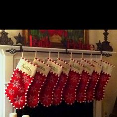 christmas stockings hanging from a fireplace mantel