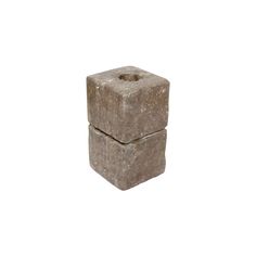 two square concrete blocks stacked on top of each other, one with a hole in the middle