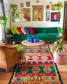 a living room filled with furniture and colorful rugs