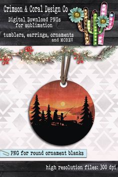 a christmas ornament hanging from a tree with the sun setting in the background