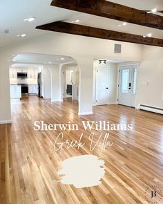 an empty living room with hardwood floors and white paint on the walls that says sherylin williams get off