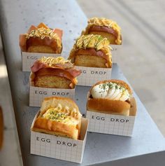 six different types of breads on display for sale