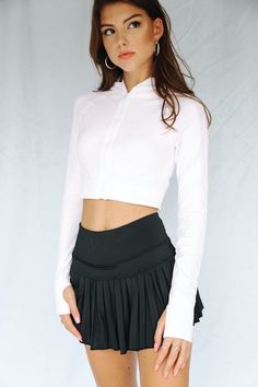 Our NEW Black Pleated Tennis Skirt is an absolute show stopper! It is the BEST everyday piece to add to your wardrobe because of its versatility & functionality. Easily dress it up for a cute, effortless look or throw it on for your most intense workout! This exclusively designed Gold Hinge skirt is made of quick dry material and can take on any activity such as golf, tennis, running and more. 80% Poly Blend, 20% Athletic Tech Spandex Sweat-wicking Material Built-in-Shorts & Inside Pocke Gold Hinge Skirt Outfit, Casual Outfits Athletic, Gold Hinge Skirt, Tennis Skirt Black, Beach Maxi Skirt, Latina Outfit, Skirt Outfit Ideas, Outfits Athletic, Lululemon Skirt