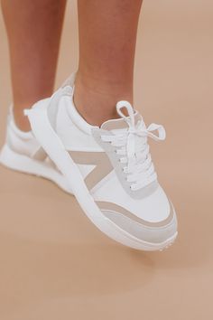 Our Neutral Sneakers - the perfect blend of comfort and style, designed to effortlessly complement any outfit in your closet. Sneakers Neutral Tan/White Sneakers Neutral, Neutral Sneakers, Dressy Sneakers, Bride Game, Minimalist Sneakers, Tan Sneakers, Neutral Tops, Neutral Shoes, Boho Fashion Summer