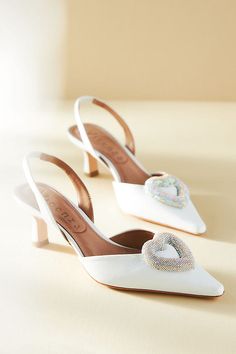 Finished with a rhinestone-encrusted heart, these pointed-toe slingback pumps are ready for all your magical moments. | Heart Slingback Kitten-Heel Pumps by Vicenza in White, Women's, Size: 36, Leather at Anthropologie Lace Kitten Heels, Barker Wedding, Classic Wedding Shoes, White Kitten Heels, Bridal 2023, Vintage Pumps, Wedding Shoes Bride, Kitten Heel Shoes, White Wedding Shoes