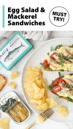 an egg salad and mackerel sandwiches on a white plate with potato chips next to it