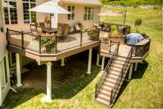 an aerial view of a deck and patio area