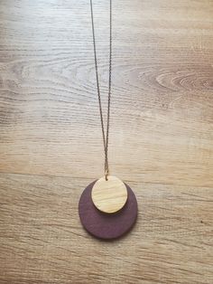 Necklace with wood pendant. Multiple sizes, mutilple wood tones to choose from. Adjustable Brown Wooden Necklaces, Brown Wooden Pendant Jewelry, Minimalist Brown Necklace For Everyday, Brown Wooden Beads Pendant Necklace, Brown Handmade Necklaces For Everyday Wear, Handmade Brown Necklace For Everyday Wear, Natural Wood Pendant Necklace, Brown Round Wooden Jewelry, Everyday Handmade Brown Necklaces