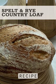 a loaf of bread sitting on top of a wooden table