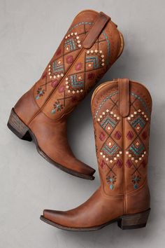 The bright embroidery and rugged construction of the Florence leather boots give them their distinct character. Free shipping + returns. Bright Embroidery, Waterproof Suede Boots, Suede Cowboy Boots, Chambray Skirt, City Scape, Embroidered Boots, Bustling City, Suede Leather Shoes, Embroidered Leather