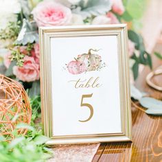 the table numbers are displayed in gold frames