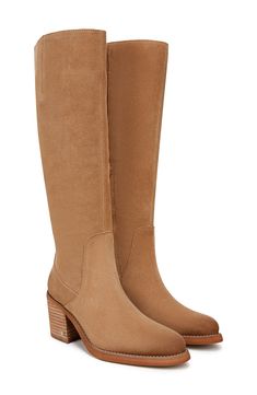 A stacked heel boosts a knee-grazing boot that makes any ensemble more sleek. 2 3/4" heel 15" shaft; 14" calf circumference. Regular calf 15" shaft; 16" calf circumference. Wide calf Side zip closure Leather upper/synthetic lining and sole Imported Wide Calf, Stacked Heel, Sam Edelman, Knee High Boots, Side Zip, Knee High, Caramel, Womens Boots, Leather Upper