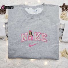 Pink Bratz Doll x Nike Swoosh Sweatshirt: Custom Embroidered Hoodie Perfect Family Gifts Nike Cartoon, Disney Character Shirts, Nike Inspired, Best Family Gifts, Maroon Hoodie, Embroidered Shirts, Mike Wazowski, Heart Embroidery, Hoodie Material