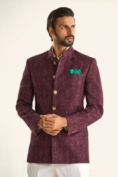 Wine silk bandhgala with tonal floral jacquard pattern and sequin embroidery work. - Aza Fashions Luxury Winter Bandhgala With Floral Embroidery, Luxury Long Sleeve Bandhgala With Embroidered Border, Elegant Bandhgala With Motifs, Formal Sherwani With Zari Weaving In Traditional Drape, Formal Festival Kurta With Zari Weaving, Formal Kurta With Zari Weaving For Festivals, Formal Brocade Set With Zari Weaving, Festive Semi-formal Traditional Wear With Pallu, Formal Traditional Kurta With Motifs