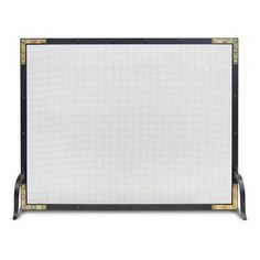 a black and white fireplace screen with gold trimmings on the sides, against a white background