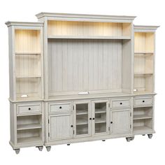 a white entertainment center with wooden shelves and doors on each side is shown in front of a white background