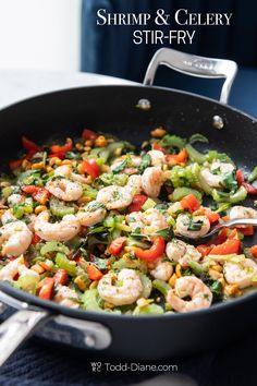 shrimp and celery stir fry in a skillet