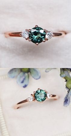 three different types of engagement rings on a white cloth with blue flowers in the background