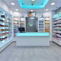 an empty pharmacy with shelves full of medicine