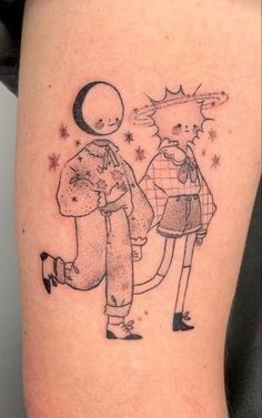 a tattoo with an image of two people on it