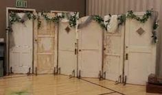 the room is decorated with white doors and ivys on them, along with other decorations