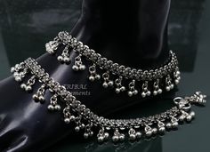 This is a gorgeous anklet you just look queen by wearing this , it is made from 925 sterling silver, gorgeous vintage antique stylish ankle feet bracelet, anklets. gorgeous ankle jewelry for belly dance wedding party tribal fabulous jewelry from Rajasthan India. Metal-925 sterling silver Item type-Anklets. length of anklet-10.5 INCHES Width-2.1 centimetre with bells. Weight-51 grams (Single weight) Finish-oxidized. STAMPED-925 Makes excellent gifting and collectable pieces. Feet Bracelet, Silver Payal, Foot Bracelet, Ankle Jewelry, Silver Anklets, Rajasthan India, Ear Rings, Fabulous Jewelry, Anklet Jewelry