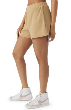 A waffle-textured thermal knit keeps you extra comfy as you go about the business of lounging around in these relaxed-fit shorts topped with an elastic waist. 2 1/2" inseam; 12 1/4" front rise 65% polyester, 35% cotton with 100% cotton contrast Machine wash, dry flat Imported Comfy Leisure Shorts With Ribbed Waistband, Cotton Khaki Shorts For Loungewear, Comfortable Cotton Shorts With Ribbed Waistband, Knit Shorts With Elastic Waistband, Waffle Knit Shorts, Denim Cutoff Shorts, Denim Cutoffs, Knit Shorts, Cut Off Shorts