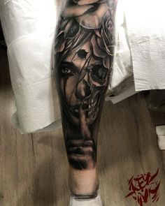 a person with a tattoo on their leg