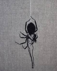 a drawing of a spider on the back of a shirt