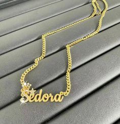 --Bling Gold Name Necklace,Custom Name Necklace,Name Necklace Gold,Cuban Chain Necklace,Name Plate Necklace,Personalized Necklace Women Men The most unique jewelry you can find, a perfect gift for your friend, family, or for yourself.  ❤️ Made and shipped from the USA ❤️ NO FADE / NONTARNISH / WATERPROOF ❤️ High-quality materials and attention to detail ❤️Color: Silver, Gold, Rose Gold ❤️ Our Process time is about 5 - 10 business days upon ordering.         The Transportation time is 4-7 Days. E Personalized Cuban Link Necklaces For Gift, Personalized Cuban Link Necklace As Gift, Personalized Cuban Link Necklace For Gift, Metal Pendant Necklace With Name, Gold Cuban Link Name Necklace, Nameplate Chain Necklace Gift, Personalized Gold Chain Necklace, Customized Gold Cuban Link Necklaces, Customized Gold Cuban Link Jewelry