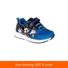 children's shoes with mickey mouse on the front and side, which are available in blue