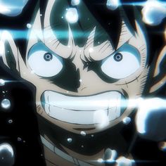 an anime character with blue eyes and black hair is looking at the camera while surrounded by bubbles