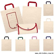 several different types of bags with handles on each side and one has a red handle