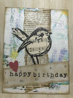 a happy birthday card with an image of a bird and music notes on the front