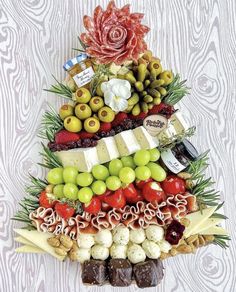 a christmas tree made out of different types of food