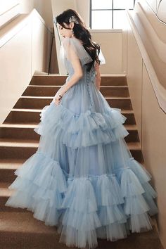 Blue Ruffled Dress For Debutante Ball, Blue Tulle Dress With Spaghetti Straps, Light Blue Spaghetti Strap Wedding Dress, Blue Spaghetti Strap Dress For Wedding, Blue Wedding Dress With Corset Back, Blue Gown With Corset Back For Debutante Ball, Blue Spaghetti Strap Dress For Debutante Ball, Blue Tulle Dresses With Corset Back, Blue Ball Gown With Corset Back For Prom Season