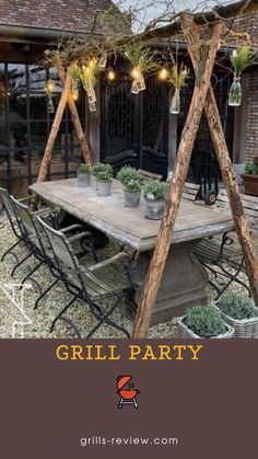 the grill party is set up outside with potted plants