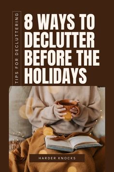 a person holding a cup and book with the title 8 ways to declutter before the holidays