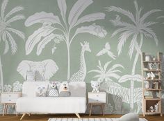 a baby's room with green and white wallpaper