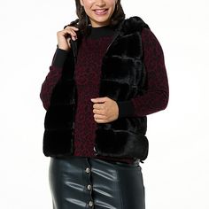 kathy ireland® Fashion 360 Bunny Hunny Reversible Faux Fur Vest Whether you're running errands around town or heading out for a winter hike, this vest is perfect for any occasion. Luxuriously soft and warm, the reversible design features a stylish faux fur on one side and a woven nylon fabric on the other, allowing you to switch up your look with ease. Wear it layered over your favorite sweater and jeans, or dressed up with a pencil skirt and boots for a night out on the town. Pencil Skirt And Boots, Winter Hike, Ireland Fashion, Sweater And Jeans, Skirt And Boots, Faux Fur Vest Black, Kathy Ireland, Reversible Vest, Faux Fur Vest