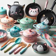 a collection of kitchen utensils with cats painted on the lids and spoons