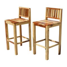 two wooden chairs sitting next to each other