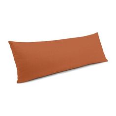 an orange pillow on a white background