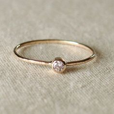 Simple Rose Gold Diamond Ring For Anniversary, Minimalist Rose Gold Diamond Ring With Bezel Setting, Simple Rose Gold Anniversary Diamond Ring, Everyday Rose Gold Stackable Rings With Bezel Setting, Simple Rose Gold Diamond Promise Ring, Simple Rose Gold Promise Ring, Delicate Rose Gold Diamond Ring With Simple Design, Simple Rose Gold Ring With Single Diamond, Delicate Rose Gold Ring With Bezel Setting