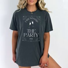 Tarot Card Bachelorette Comfort Colors® Shirt The Party Looking for the perfect bachelorette party t-shirt? Look no further than our trendy and stylish tarot card bachelorette shirt! Featuring a stunning design inspired by tarot reading, this shirt is sure to turn heads and make a statement at any celebration. Matching Group Shirt: The Coven: https://www.etsy.com/listing/1432476547 Soul Sister: https://www.etsy.com/listing/1432418273 The Party: https://www.etsy.com/listing/1418281792 The Babe: h Crew Neck T-shirt For Party Season Night Out, Fitted Party Shirt With Graphic Print, Graphic Print Short Sleeve Party Tops, Crew Neck T-shirt For Night Out And Party Season, Graphic Print Top For Party Season, Graphic Print Tops For Party Season, Hen Party Short Sleeve T-shirt With Letter Print, Party T-shirt With Text Print, Party T-shirt With Text Print And Short Sleeves