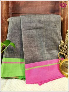 Patteda Anchu sarees are handwoven Handloom sarees from in and around the Villages of Gajendragarh,Karnataka. The saree is name after it’s border and checks pattern is also know as Dundina seraa, devaru seraa,laxmi seraa or pooja seraa. This Patteda Anchu saree is certified with a Handloom Mark and is perfect for the summer weather. It is lightweight for comfort and features a Grey body with a Ganga Jamuna border in pink and Green . The modern yet elegant design makes any outing special and incl Checks Pattern, The Villages, Summer Weather, Handloom Saree, Check Pattern, Blouse Piece, Summer Sale, Elegant Design, Pink And Green